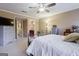 Spacious bedroom with carpeted floors and a ceiling fan at 312 Brittany Ct, Duluth, GA 30096