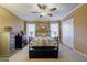 Spacious bedroom with iron bed frame and ceiling fan at 312 Brittany Ct, Duluth, GA 30096