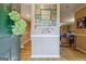 Bright entryway with mirror and view into living area at 312 Brittany Ct, Duluth, GA 30096
