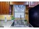 Kitchen sink with stainless steel double basin and faucet at 312 Brittany Ct, Duluth, GA 30096