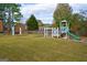 Community playground with playset and exercise equipment at 312 Brittany Ct, Duluth, GA 30096