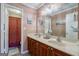 Bathroom with double sinks and a separate shower/tub at 312 Brittany Ct, Duluth, GA 30096