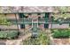 Two-story building with balconies, stone accents, and landscaping at 312 Brittany Ct, Duluth, GA 30096