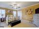 Spacious bedroom with iron bed frame and ceiling fan at 312 Brittany Ct, Duluth, GA 30096