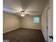 Spacious bedroom with carpet flooring and ceiling fan at 6410 Buckhurst Trl, Atlanta, GA 30349