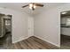 Well-lit bedroom with ceiling fan and hardwood floors at 1262 Lorenzo Sw Dr, Atlanta, GA 30310