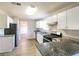 Kitchen with granite countertops and stainless steel appliances at 2124 Hairston Creek Pkwy, Decatur, GA 30035