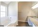 Bathroom with granite vanity, white tile, and bathtub at 2124 Hairston Creek Pkwy, Decatur, GA 30035