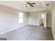 Main bedroom with ceiling fan and grey carpeting at 2124 Hairston Creek Pkwy, Decatur, GA 30035