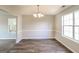 Bright dining room with hardwood floors and neutral walls at 2124 Hairston Creek Pkwy, Decatur, GA 30035