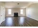 Spacious living room with hardwood floors and a fireplace at 2124 Hairston Creek Pkwy, Decatur, GA 30035