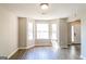 Bright dining area with bay window and hardwood floors at 2124 Hairston Creek Pkwy, Decatur, GA 30035