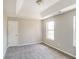 Bedroom with grey carpeting and a window at 2124 Hairston Creek Pkwy, Decatur, GA 30035