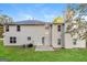 Two-story house with a backyard patio at 7546 Petal Pl, Fairburn, GA 30213