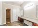 Bathroom with granite countertops and double sinks at 7546 Petal Pl, Fairburn, GA 30213
