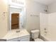Updated bathroom with a tub, toilet and vanity at 7546 Petal Pl, Fairburn, GA 30213
