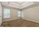 Spacious bedroom with two windows and neutral walls at 7546 Petal Pl, Fairburn, GA 30213