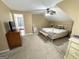 Spacious bedroom with king-size bed and ensuite bathroom access at 1307 Eddie Craig Ct, Mcdonough, GA 30252