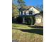 Two-story house with a well-maintained lawn and attached garage at 6722 Bent Creek Dr, Rex, GA 30273