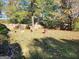 Fenced backyard with plenty of space for outdoor activities at 6722 Bent Creek Dr, Rex, GA 30273