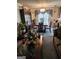 Formal dining room featuring a large table and hutch at 6722 Bent Creek Dr, Rex, GA 30273