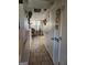 Tiled hallway with access to dining room and other areas at 6722 Bent Creek Dr, Rex, GA 30273