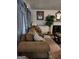 Spacious living room with comfortable seating and fireplace at 6722 Bent Creek Dr, Rex, GA 30273