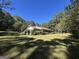 Ranch style home with brick exterior and large yard at 1500 Pine Forest Rd, Mansfield, GA 30055
