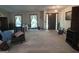 Living room with hardwood floors and access to entryway at 1500 Pine Forest Rd, Mansfield, GA 30055