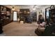 Living room with built in shelving and a brick fireplace at 1500 Pine Forest Rd, Mansfield, GA 30055