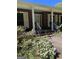Brick ranch house with a covered front porch and landscaped yard at 1500 Pine Forest Rd, Mansfield, GA 30055