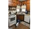 Cozy kitchen with wood cabinets and vintage appliances at 5605 Bethlehem Rd, Fairburn, GA 30213