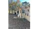 Side view of house with bench at 5605 Bethlehem Rd, Fairburn, GA 30213