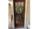 Inviting front door entrance featuring a spring wreath at 5605 Bethlehem Rd, Fairburn, GA 30213