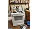 White stove and oven with decorative kettle at 5605 Bethlehem Rd, Fairburn, GA 30213