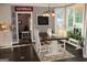 Kitchen dining area with farmhouse table and chairs, offering a bright and airy space at 3845 Glen Ian Dr, Loganville, GA 30052