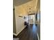 Long entryway with shiplap wall and access to living room at 3845 Glen Ian Dr, Loganville, GA 30052