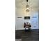 View of entryway showcasing shiplap wall and dark flooring at 3845 Glen Ian Dr, Loganville, GA 30052