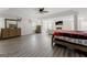 Large main bedroom with a king bed and access to the living room at 326 Cog Hill Dr, Fairburn, GA 30213