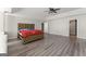 Main bedroom with a large bed and en-suite bathroom at 326 Cog Hill Dr, Fairburn, GA 30213