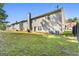 Two story house with backyard and grassy lawn at 326 Cog Hill Dr, Fairburn, GA 30213