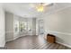 Bright dining room with wood floors and bay window at 326 Cog Hill Dr, Fairburn, GA 30213