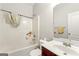 Clean bathroom with tub/shower combo, vanity, and mirror at 326 Cog Hill Dr, Fairburn, GA 30213