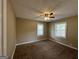 Bedroom with ceiling fan, neutral walls and carpeting at 1764 Thomas Ter, Decatur, GA 30032