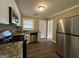 Modern kitchen with granite countertops and stainless steel appliances at 1764 Thomas Ter, Decatur, GA 30032
