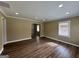 Spacious living room with dark wood floors and recessed lighting at 1764 Thomas Ter, Decatur, GA 30032