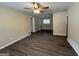 Bright living room with hardwood floors and ceiling fan at 1919 Glenmar Dr, Decatur, GA 30032