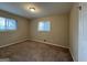Spacious bedroom with neutral walls and carpet flooring at 1919 Glenmar Dr, Decatur, GA 30032