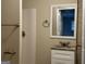 Updated bathroom with granite vanity and a large mirror at 1919 Glenmar Dr, Decatur, GA 30032
