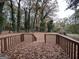 Back deck overlooking a large backyard with mature trees at 4433 Mercer Rd, Decatur, GA 30035